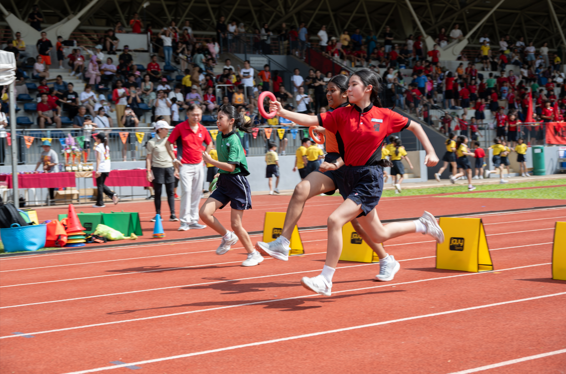 Student competing in a track and field event.